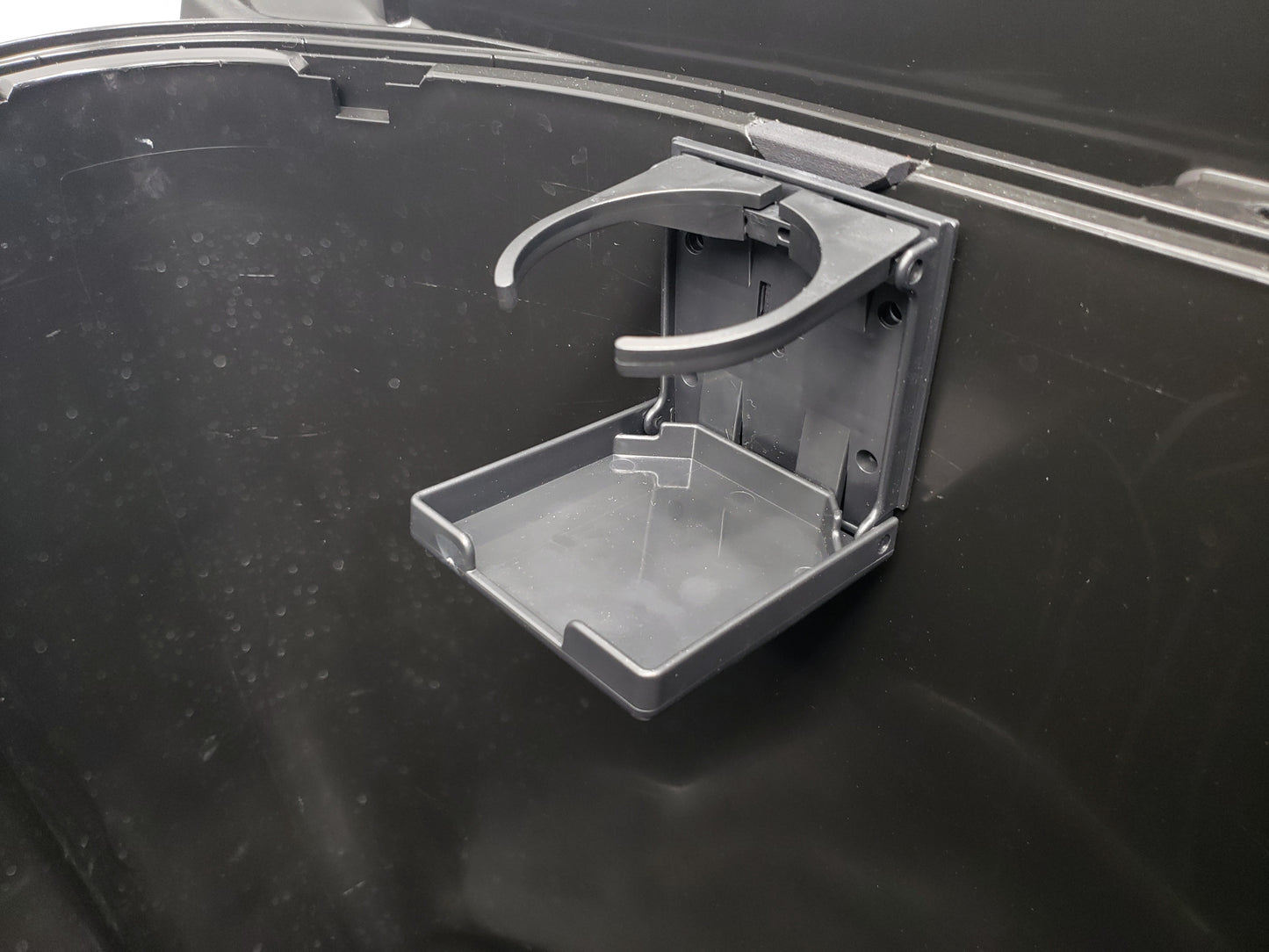 ST3 Hull Accessories Close-Up of Foldable Cup Holder in Sea Doo Storage Bin.