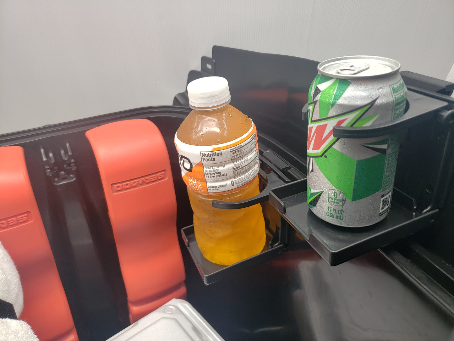 2 ST3 Hull Accessories Foldable Cup Holders in a Sea Doo ST3 Hull Storage Bin.