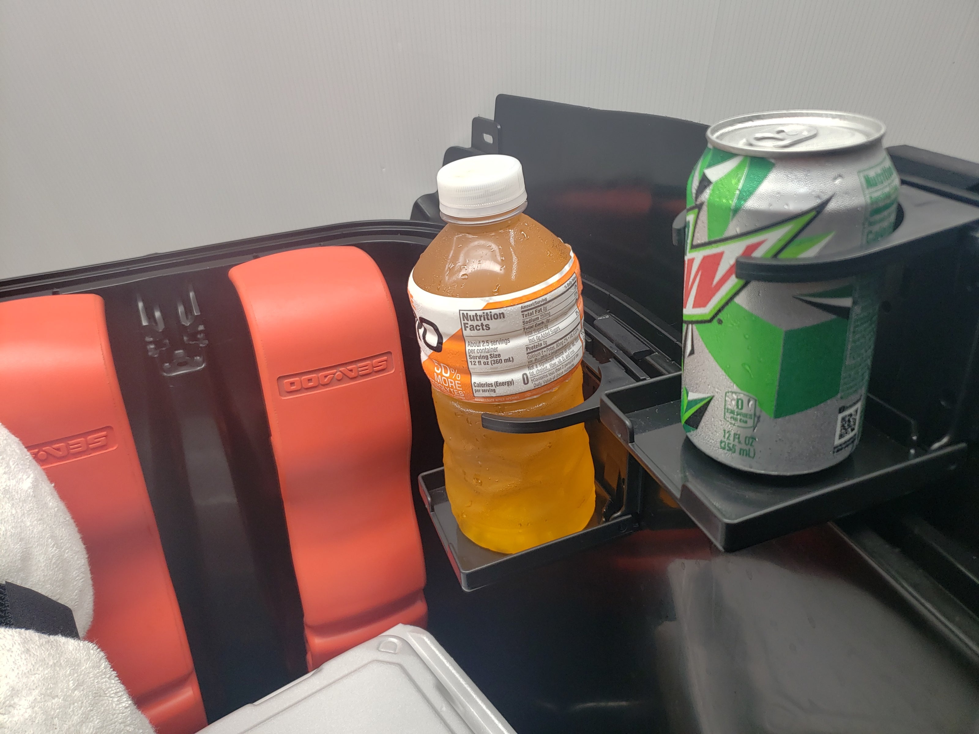 2 ST3 Hull Accessories Cup Holders in a Sea Doo ST3 Hull Storage Bin.
